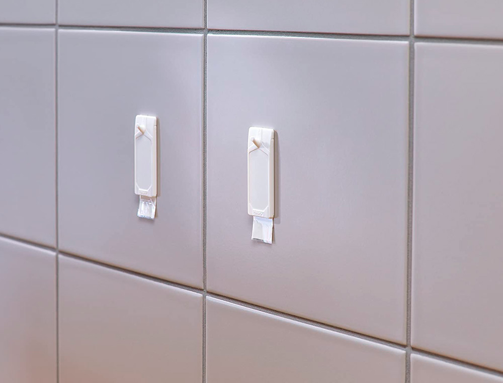 CLAVO AUTOADHESIVO TESA SUJECION HASTA 2 KG USO AZULEJOS REMOVIBLE BLISTER DE 2 UNIDADES